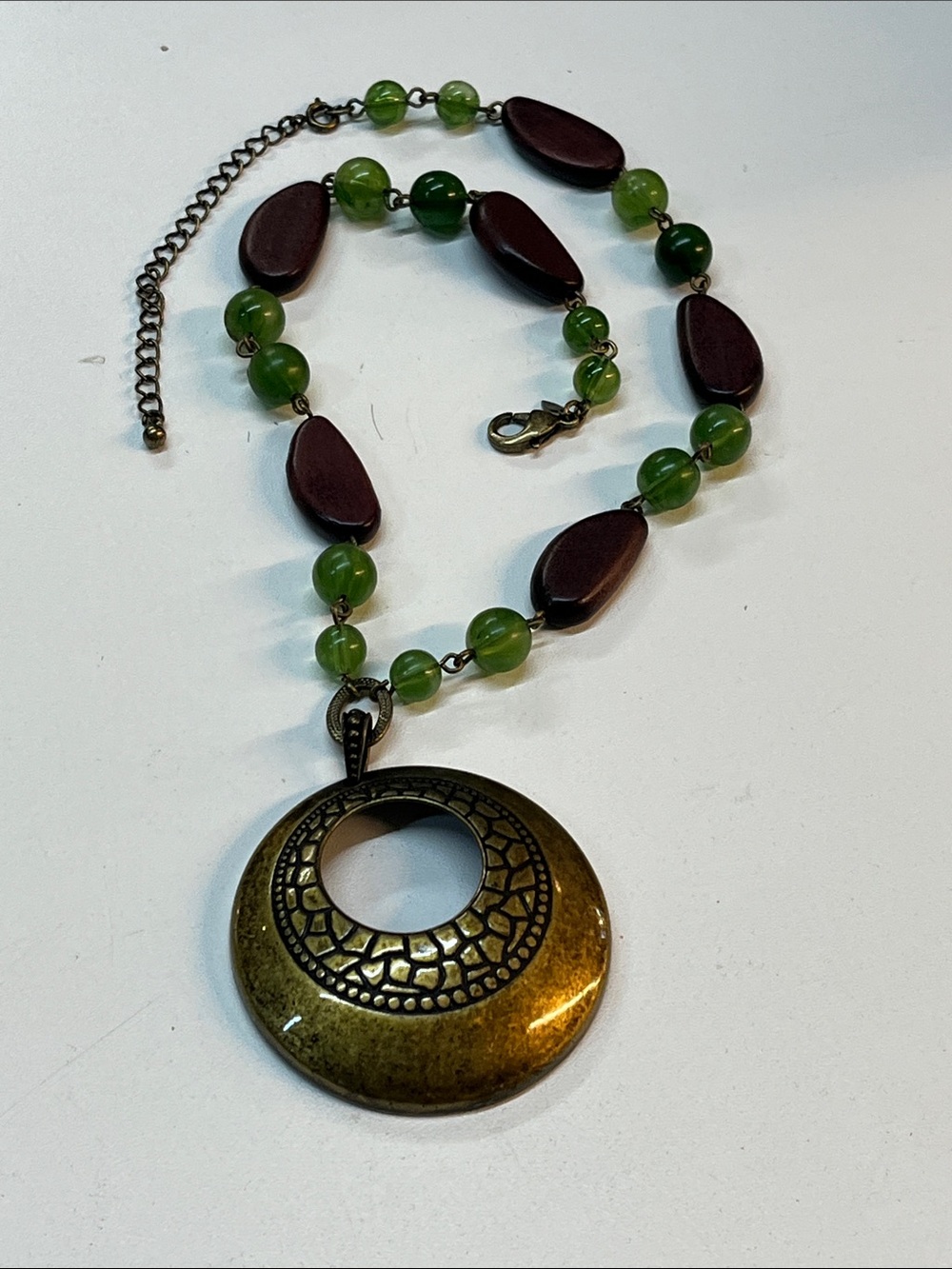 Vintage Avon SAQ Bohemian Green Bead Pendant Necklace with Antiqued Gold Disc